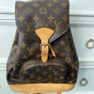 Authentic Louis Vuitton Montsouris Backpack monogram with original dustbag.